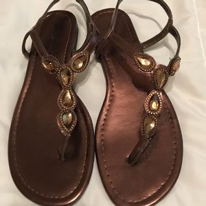 Sandals lightly worn. Pretty brown/copper color.